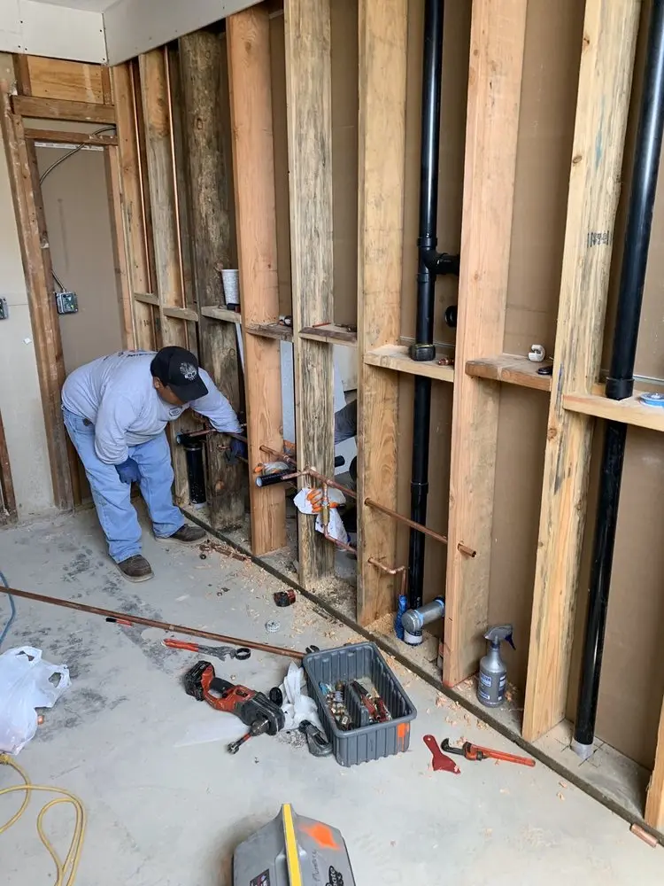 Commercial rough-in plumbing for Water Heater Replacement in John Town